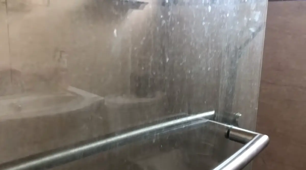 retirer calcaire porte douche